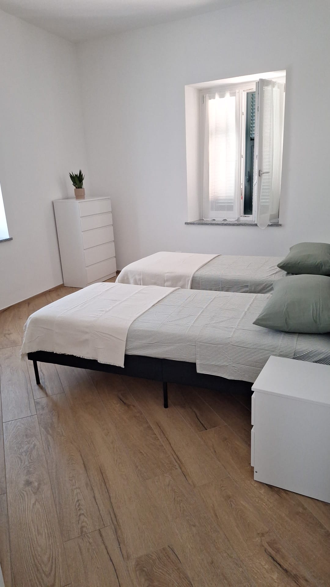 Seconda camera da letto con due letti singoli